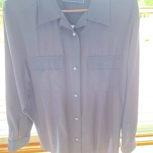 Women’s navy blue button down shirt.